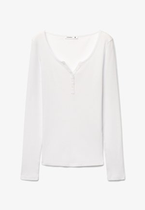 Maglietta bianca Terranova a maniche lunghe a coste, con scollo a barchetta e patta con quattro bottoni, taglia piccola.