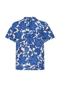 Blouse blanche à manches courtes avec un col montant, présentant un motif floral bleu audacieux sur tout le tissu.