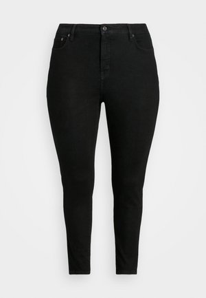 Črne skinny jeans iz denima, ki imajo klasičen pet-pocket dizajn, zapiranje na gumb in gladko teksturo z minimalnim zbledelostjo.