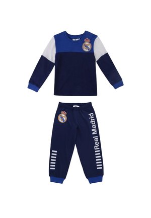 Tuta da bambino Real Madrid a due pezzi con maniche lunghe, colori blu navy e bianco, e logo della squadra su maglietta e pantaloni.