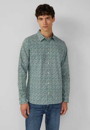 Groene langermige shirt met een bloemig patroon, knoopsluiting aan de voorkant en een klassieke kraag. De stof lijkt lichtgewicht met een gladde textuur.