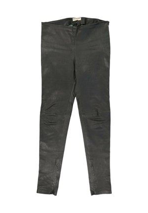 Czarne skórzane legginsy z widocznym przeszyciem, zamkami przy kostkach i metką Balenciaga na wewnętrznej gumce w pasie.
