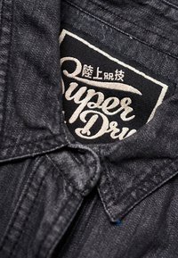 Superdry & Co Farkkumekko - black