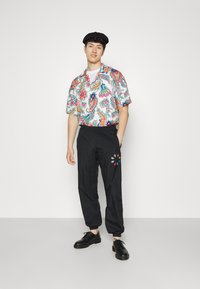 adidas Originals Pantaloni - black/multicolor