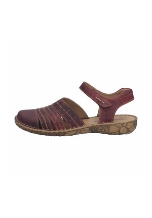 Women's maroon leather sandal with closed toe, adjustable ankle strap, and textured sole featuring floral patterns.
