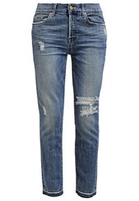 Jeans in denim azzurro chiaro con fitting slim, caratteristiche distressed, dettagli strappati sfilacciati sulle ginocchia e design classico a cinque tasche.