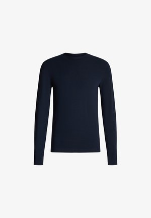 Camicia a maniche lunghe di colore blu navy, realizzata in un tessuto morbido e liscio. Presenta un collo a giro e maniche aderenti senza motivi né decorazioni.