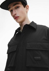 Calvin Klein Jeans RELAXED - Veste mi-saison - ck black