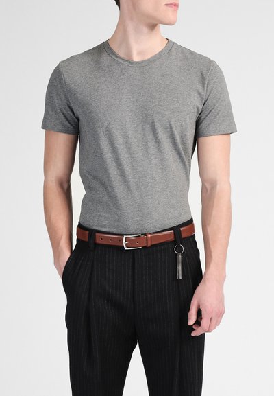 Gray short-sleeve t-shirt with a round neck, paired with black pinstriped trousers and a brown leather belt featuring a silver buckle.