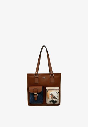 Brown faux leather tote bag with two front pockets: one navy blue with a buckle and one white with a bird illustration and zipper detail.