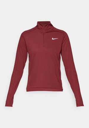 Bordeaux langermet treningsgenser med halv-zip og hvit Nike-logo på brystet. Laget av et glatt, elastisk materiale.