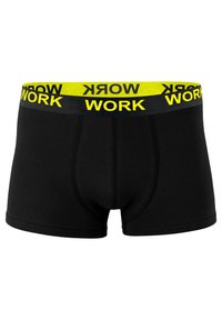 Boxer da uomo neri a vestibilità aderente, con una cintura elastica gialla su cui è stampato in nero "WORK". Texture liscia, design moderno.