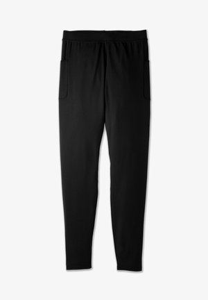 Zwarte leggings met een zachte textuur, elastische tailleband en twee zijkanten zakken. Strak ontwerp dat aan de enkels smaller wordt.