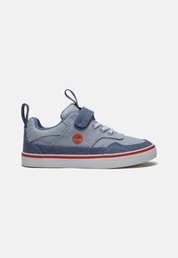 Low-top blue and grey sneaker with red logo, white sole with red stripe, hook-and-loop strap, laces, and pull tabs at heel and tongue.