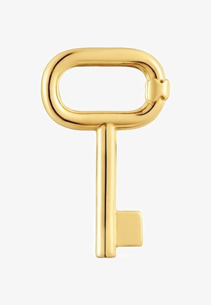 Llave dorada brillante con un arco rectangular redondeado que presenta un pequeño detalle en forma de lazo en un lado y una simple muesca rectangular.