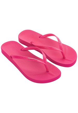 Infradito rosa con plantare testurizzato, cinturini sottili e design semplice, realizzate in materiale gommoso flessibile.