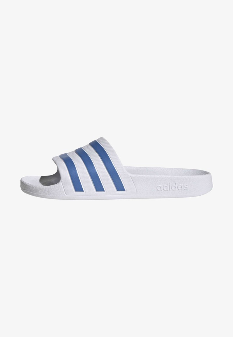 White slide sandal with three horizontal blue stripes on the strap, textured material, open toe design, and embossed logo on the side.