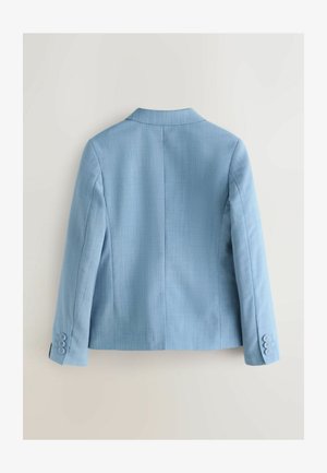 Gaiši zils žakete ar gludu tekstūru, vienrindu pogu aizdari, izgrieztu apkakli un aproču pogām ar trim pogām katrā piedurknē.