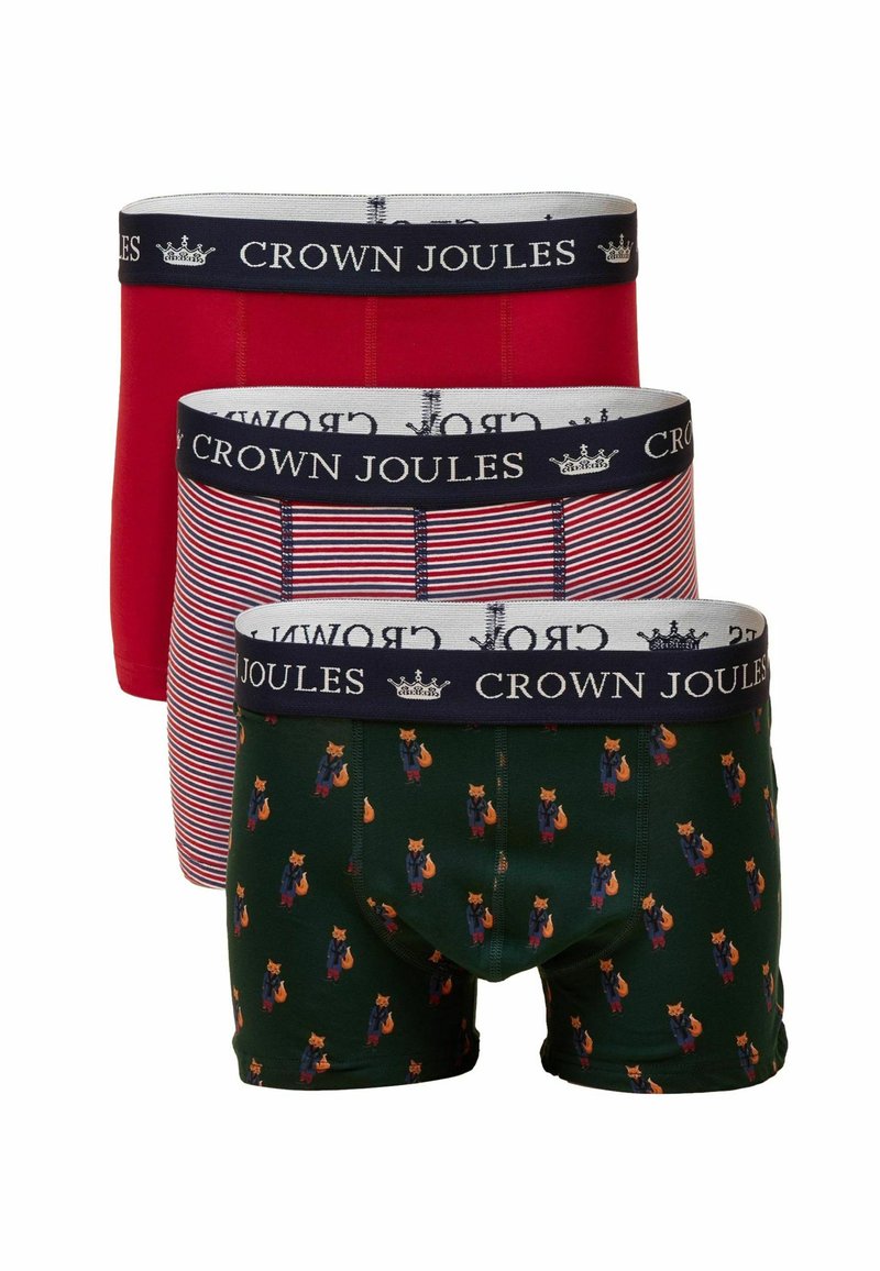Three pairs of men's boxers: red, red striped, and dark green with fox print. All feature a navy band with "CROWN JOULES" logo.