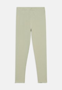 Light green ribbed leggings with elastic waistband and lettuce-edge hems laid flat on white background.