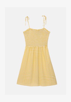 Sárga kockás ruha, ráncolt mellszélességgel, állítható pántokkal és bővülő szoknyával. Az egész ruhán kockás minta található.