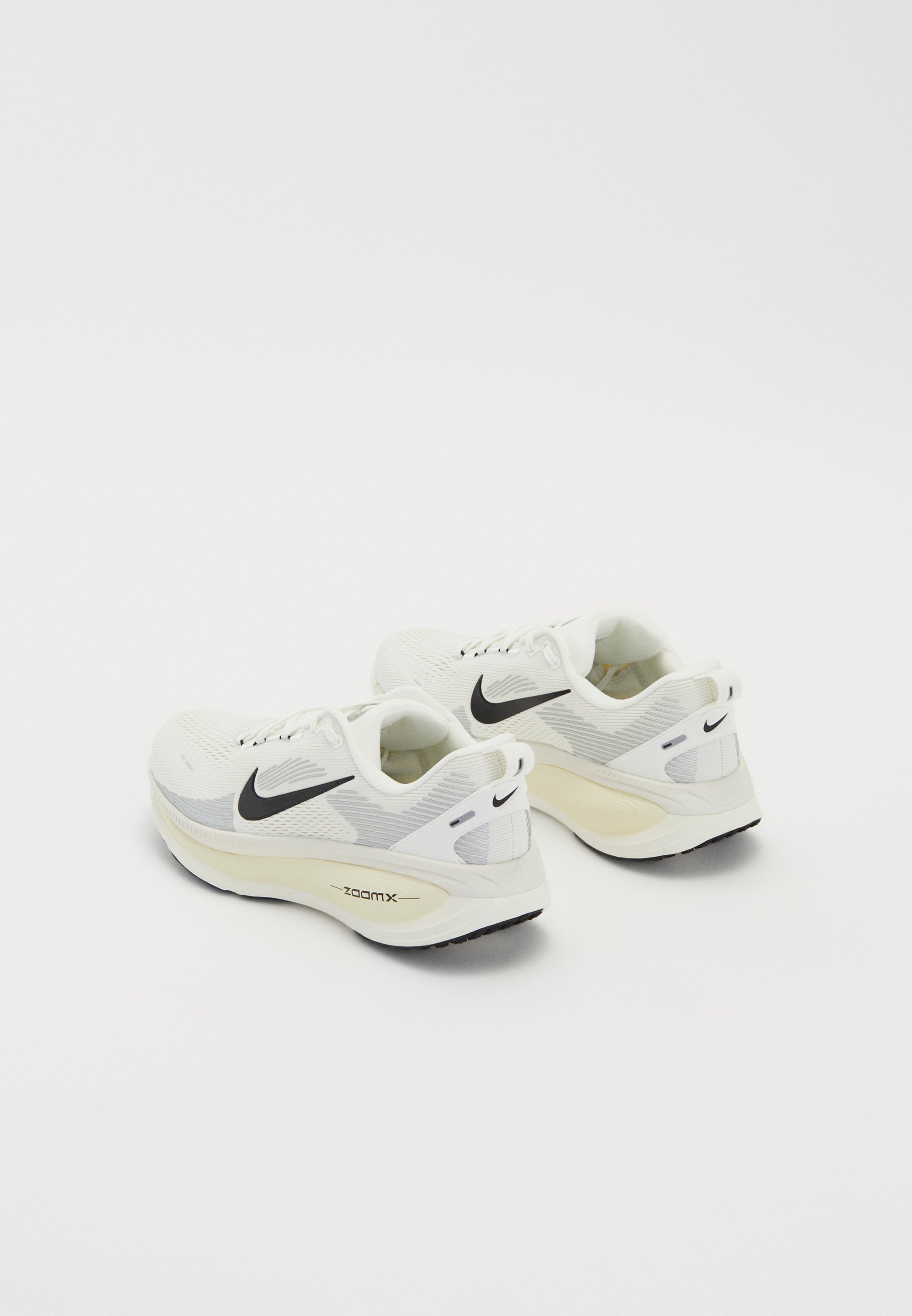 white and cream nike shoes
