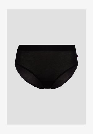 Schwarze nahtlose Bikini-Unterwäsche mit mittelhohem Bund und einem kleinen Seitenschild mit einem Herzsymbol auf einem grauen Hintergrund.