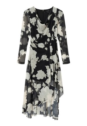 Sort langærmet midikjole med hvidt blomsterprint, asymmetrisk kant og draperet halsudskæring.