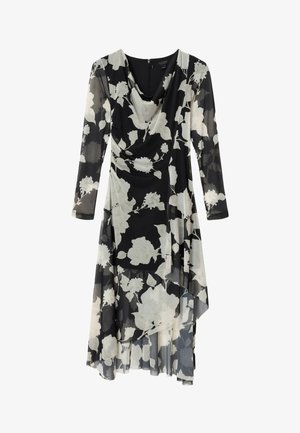 Sort langærmet midikjole med hvidt blomsterprint, asymmetrisk kant og draperet halsudskæring.