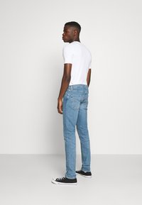 Levi's® 512® SLIM TAPER - Calças de ganga justas - amalfi pool