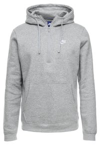 Grå huvtröja i bomullsmaterial, med halvdragkedja fram, känguruficka och broderad Nike-logotyp på bröstet.