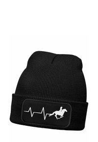 Black knitted beanie with ribbed texture. Features a rectangular patch displaying a white heartbeat line and a horse rider silhouette.