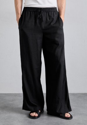 LIAN TROUSERS - Pantalones - black