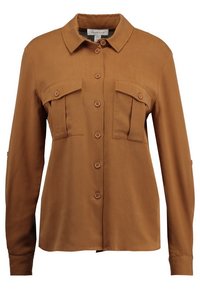 Camicia marrone a maniche lunghe con bottoni, dotata di due tasche con patta sul davanti e colletto classico.