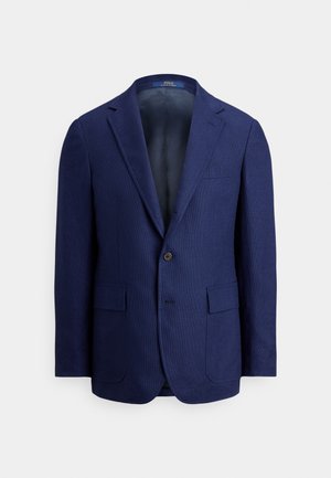 Marineblauwe herenblazer met één knoop, inkepingrevers, klepzakken en een gladde binnenvoering.