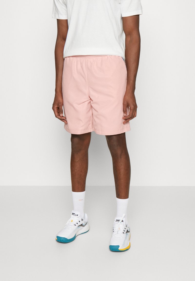 lacoste rose et blanche