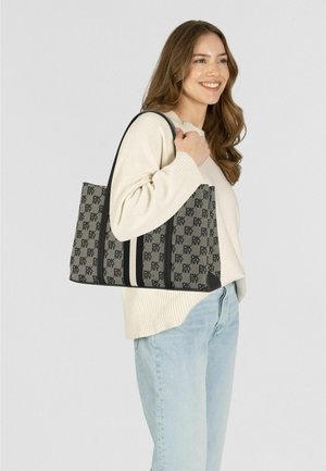 Black and gray tote bag featuring a repeating logo pattern, with a soft canvas texture and contrasting black stripes on the sides.