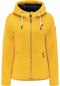 Gelbe Fleece-Hoodie mit Reißverschluss, verstellbaren Kordeln, zwei Fronttaschen und einem Logopatch am Ärmel. Weicher Stoff und entspannter Schnitt.