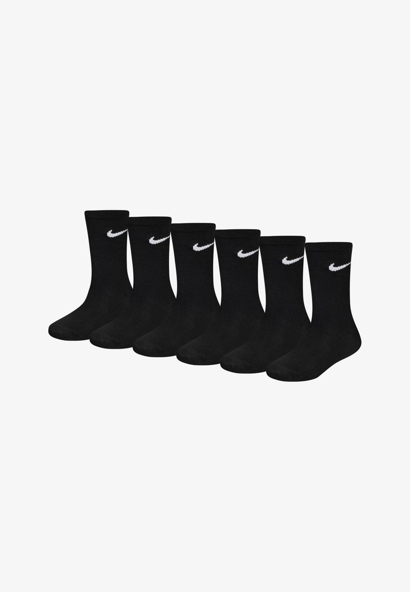 Czarne bawełniane skarpetki typu crew w zestawie sześciu sztuk, z białym logo Nike w kształcie żółwia z boku oraz przędzy ściągacza.