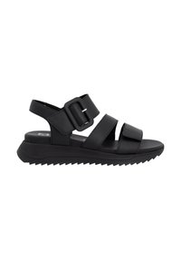 Sandalo nero con due ampie cinghie, una delle quali con una grande fibbia, una suola testurizzata e una base spessa e imbottita per il comfort.