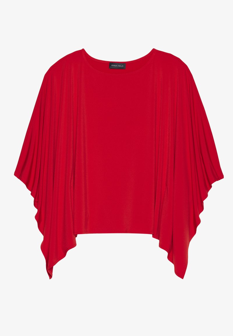 Top rosso drappeggiato realizzato in tessuto morbido, con scollatura rotonda e maniche a sbuffo, che offre una vestibilità ampia e una trama liscia.