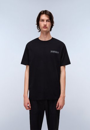 Black cotton T-shirt with a crew neck. Features a small graphic design on the left chest area. Short sleeves, relaxed fit.