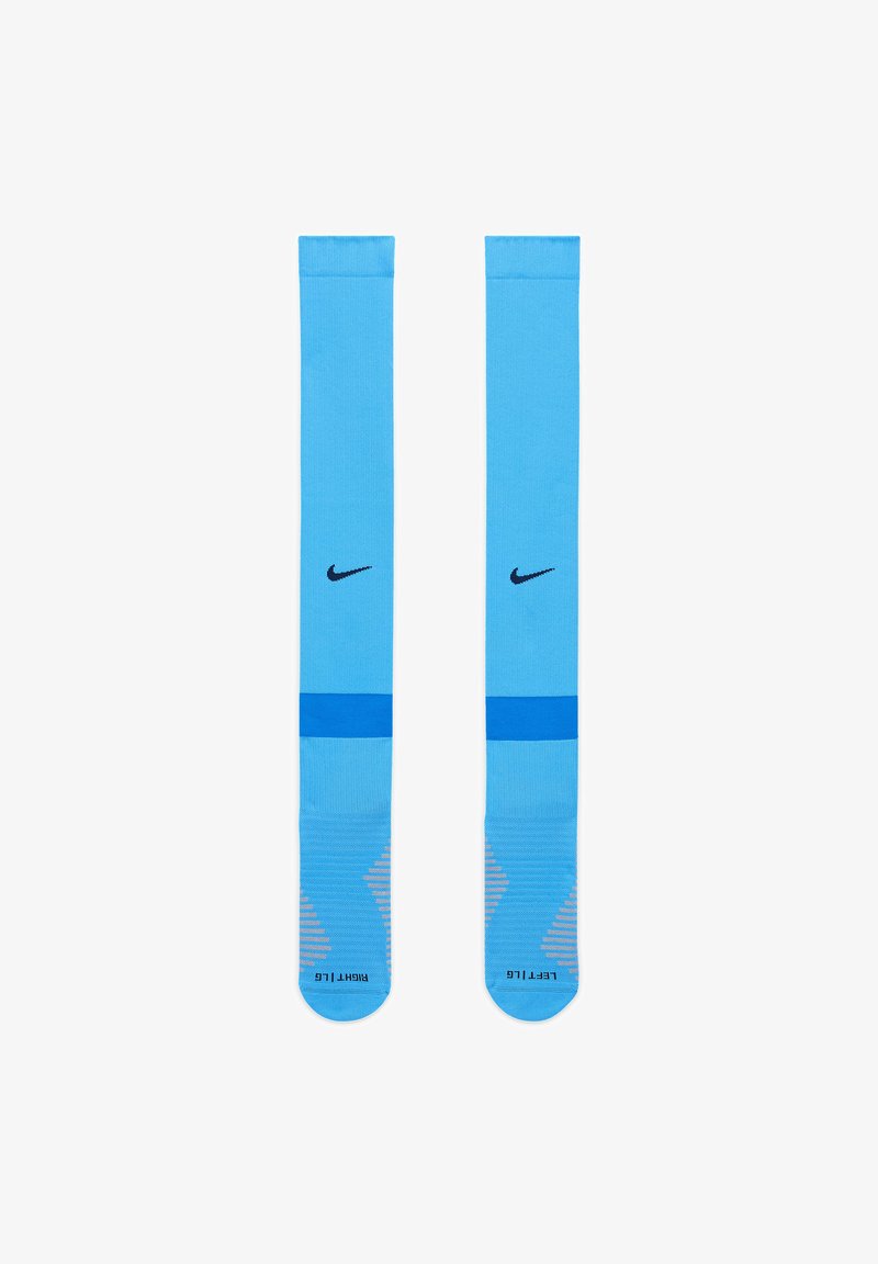 Calze sportive blu con una parte superiore uniforme, una fascia blu a contrasto e un motivo degradé nella zona del piede, con il logo Nike nero sulla parte anteriore.
