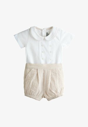 Valge lühikeste varrukatega jumpsuit Peter Pani kraega, nööpide ja beežide triibuliste lühikestega. Pehme puuvillane materjal põimitud tekstuuriga.