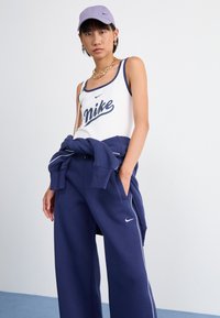 Nike Sportswear PANT - Treniņtērpa apakšdaļas - midnight navy