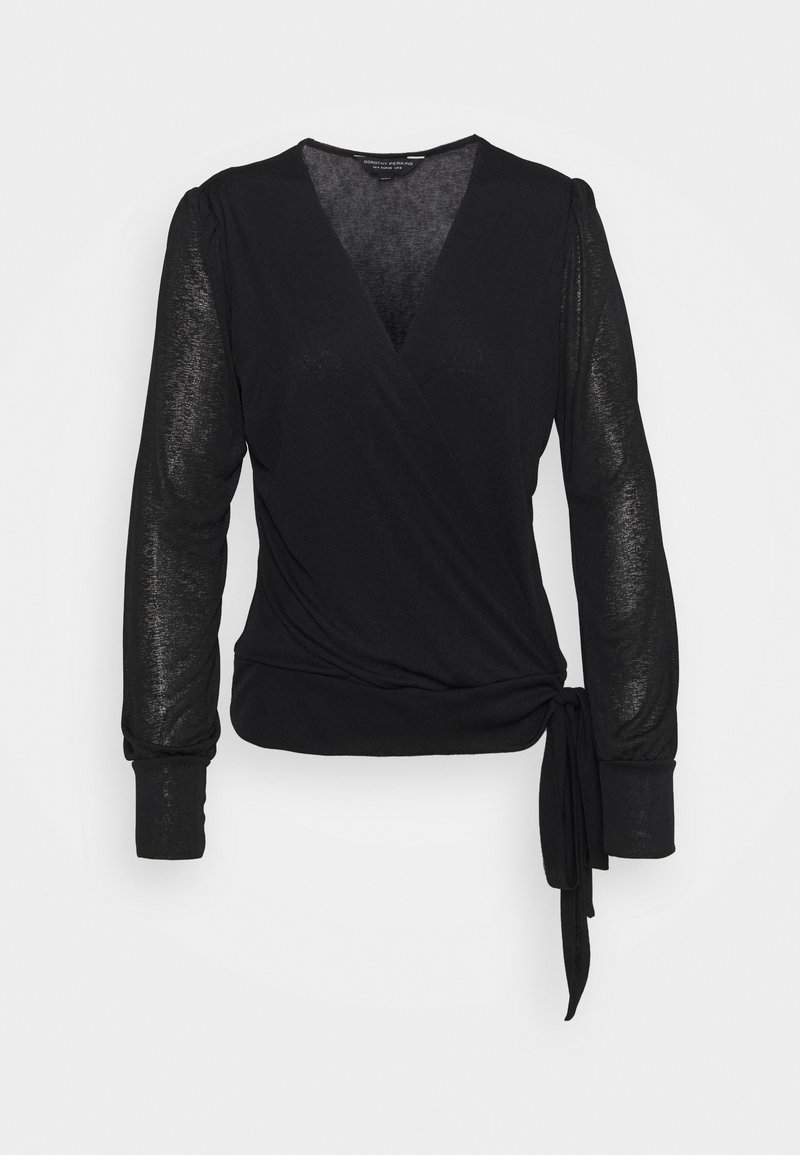 Black long-sleeve wrap top with slightly sheer textured fabric, V-neckline, fitted cuffs, and side tie detail at the waist.