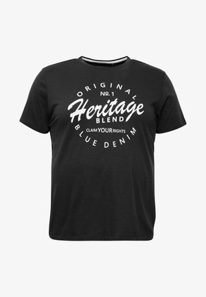 Sort bomuld t-shirt med rund hals, korte ærmer og stor hvid grafisk tekst, der står "Original No. 1 Heritage Blend" på forsiden.