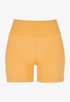 Högmidjade, senapsgula shorts tillverkade av ett stretchigt material. Slät yta med en figurnära design och ren söm vid nederkant.