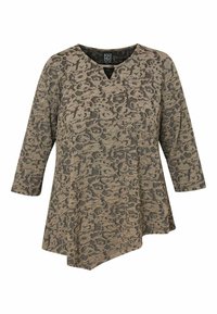 Aszimmetrikus tunika bézs színben, sötét leopárdmintával. V-kivágással és háromnegyedes ujjal rendelkezik, textúrált anyagból készült a kényelem érdekében.