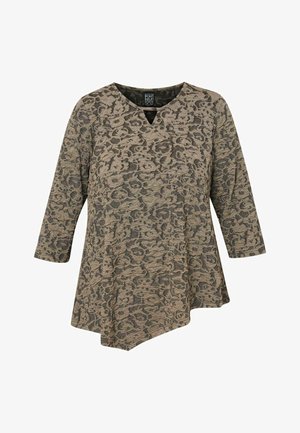 Asymetrická tunika v béžovej farbe s tmavým leopardím vzorom. Obsahuje výstrih do V a trojštvrťové rukávy, vyrobená z textúrovanej tkaniny pre pohodlie.